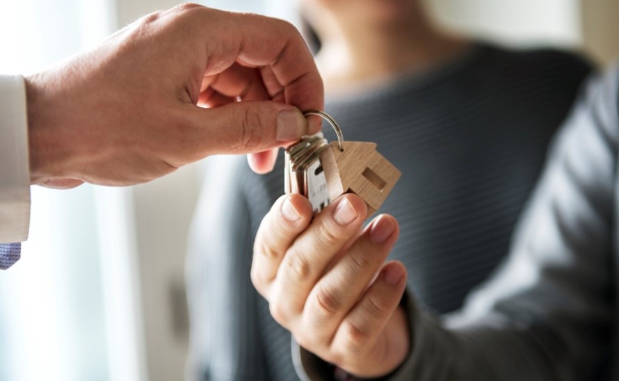 Handing over the keys to a new house